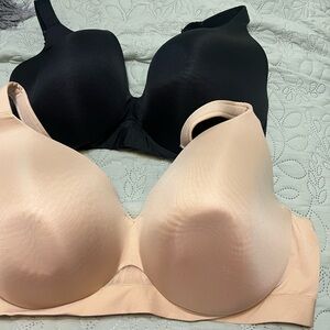 A set of Lane Bryant Bliss bras 1 Black and 1 Cream.